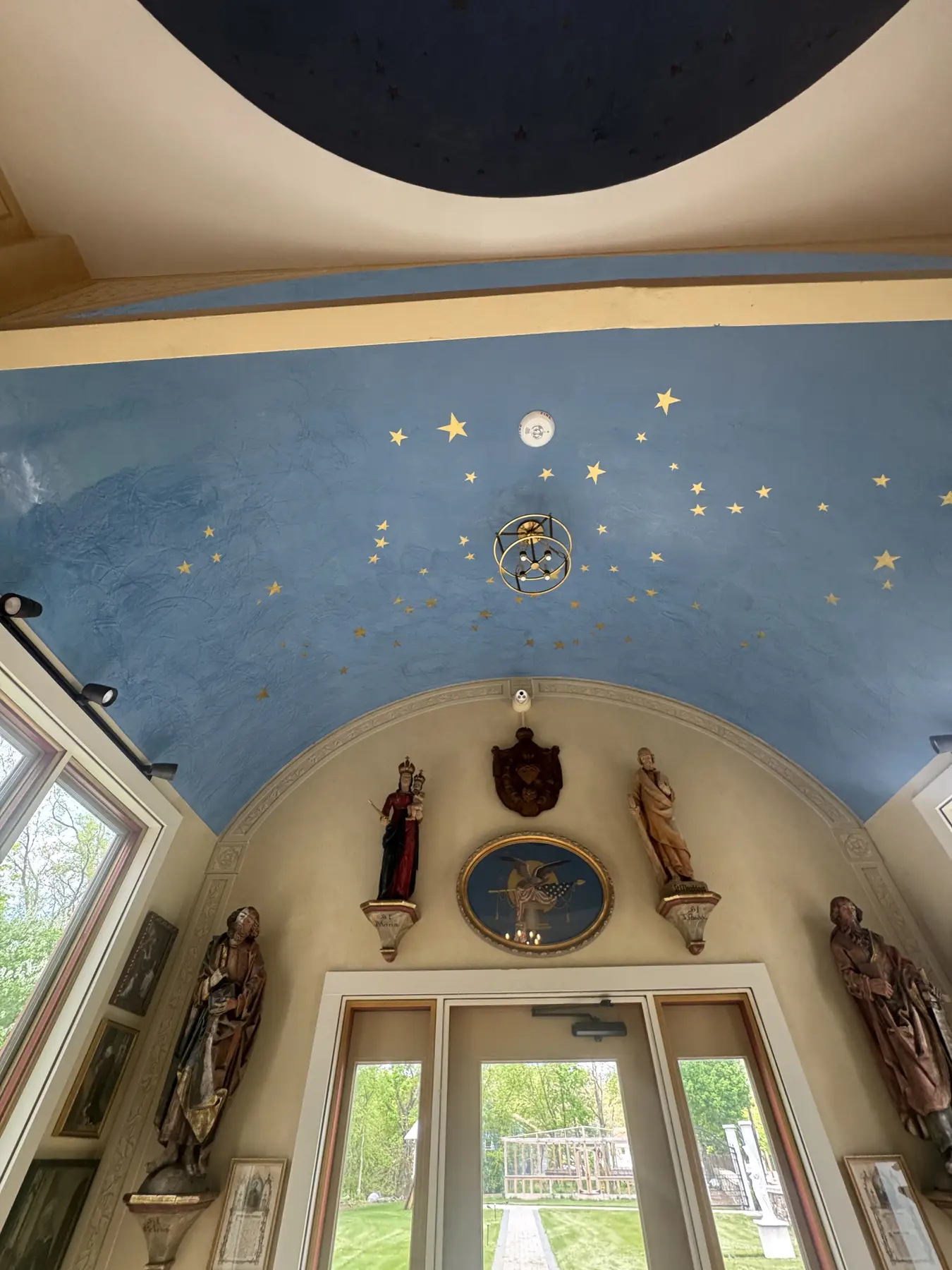 Vaulted plaster ceiling before restoration, cracked and aged
