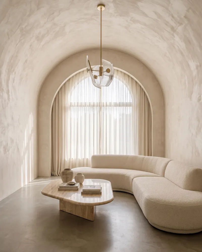 Living room with a barrel vault ceiling finished in Venetian plaster