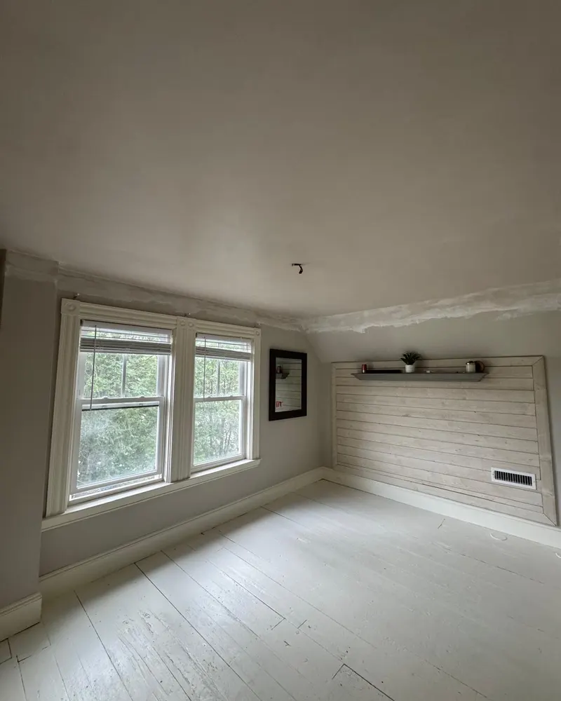 Bedroom ceiling fully repaired after water damage
